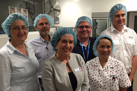 TAFE Queensland Gold Coast General Manager Jenny Dodd (centre) with Gold Coast Health Food Services staff, including Bea Buxton and Philip Hoy (on right) who will benefit from the new partnership.